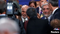 غنی و عبدالله در یک سفر خارجی