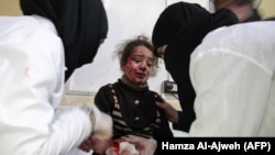 Жертва обстрелов одного из пригородов Дамаска, 6 января 2018