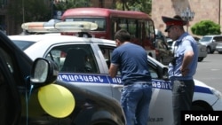 Armenia - A driver is fined by traffic police in Yerevan, 25May2012.