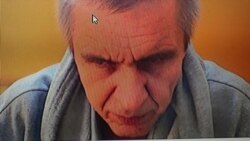 Віктор Міхед на лаві підсудних з Маріпольского СІЗО №2 у режимі відеоконференції