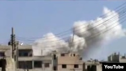  Хомс шаарынын ныптасындагы Баба Амр районундагы үйлөр артиллериялык аткылоодон кийин. 5-февраль, 2012