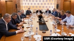 Leaders of Romania's pro-Western parties agreed on December 10 to forge a governing coalition to keep Moscow-friendly parties out of the government. 