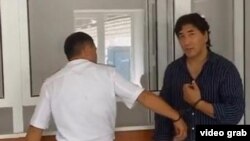 Barlyq Mendighaziev appears in court in 2013.