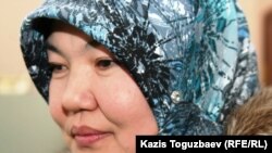 Рита Абишева, жена узбекского беженца-мусульманина Шухрата Холбаева. Алматы, 13 декабря 2010 года.