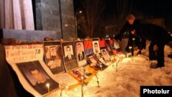 Pictures of opposition supporters killed in Yerevan in March 2008 have been placed at the site of the deadly postelection unrest.