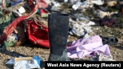 На месте падения фрагментов потерпевшего крушение самолета «Международных авиалиний Украины» (МАУ) Boeing 737-800. Тегеран, 8 января 2020 года.