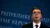 Serbian President Aleksandar Vucic speaks during a press conference after talks with Bosnia's three-member presidency in Belgrade on December 6.