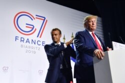 Дональд Трамп и президент Франции Эммануэль Макрон на предыдущем саммите G7 во французском Биаррице, август 2019