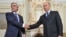Russia -- Russia's president Vladimir Putin (R) and Armenia's president Serzh Sarkisian shake hands during a meeting at Novo-Ogaryovo residence, Moscow, September 3, 2013.