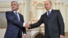 Russian President Vladimir Putin (right) meets with his Armenian counterpart, Serzh Sarkisian, in Moscow on September 3. 