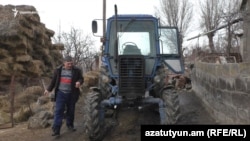 Armenia -- Gor Karapetian, a farmer from Haykavan village, shows his tractor that was stolen on the Turkish border in September, February 11, 2019.