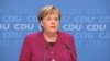 GRAB - Merkel Announces Plan To Quit 