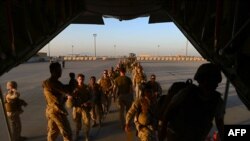 سربازان امریکایی در حال خروج از کمپ بسشن از ولایت هلمند October 26, 2014