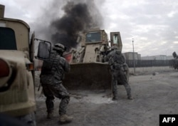 Increased troop numbers saw the United States make inroads against Al-Qaeda in Iraq between 2006 and 2008.