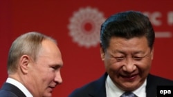 Владимир Путин ва Сӣ Ҷинпинг, раҳбарони Русияву Чин