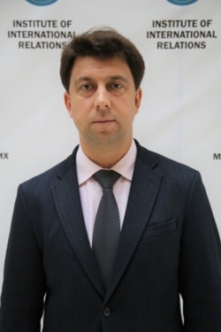 Доцент кафедри міжнародного права Інституту міжнародних відносин КНУ ім. Шевченка Захар Тропін