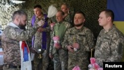 Ukrain esgerleri pashany belleýär