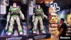 Merchandise and toys depicting characters from the movie Lightyear are seen for sale in New York City.