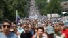 Tens of thousands of protesters march in Khabarovsk on July 18.