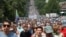 Tens of thousands of protesters march in Khabarovsk on July 18.