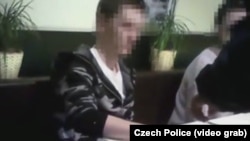 Хакер деп шектелген орус жараны камакка алынган учур. 18-октябрь, 2016-жыл. 