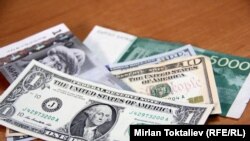 Сомы и доллары