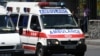 Armenia -- An ambulance vehicle is seen on Khorenatsi Street in Yerevan near a police station seized by opposition gunmen. 27July, 2016