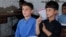 Afghan refugee children attend lessons at the refugee camp where they live near Peshawar, Pakistan.