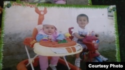 Фотография старших детей Алишера и Садбарг  
