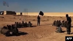 Siriýa, wideo YD-nyň nämälim ýerdäki tälim meýdançasyny görkezýär. 