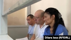 Кайрат Султанбек, Жанмурат Аштаев жана Лаззат Досмамбетова. Чымкент,  13 июль 2022 -жыл.