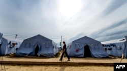 Табір біженців зі східної України біля російського міста Донецьк, серпень 2014 року