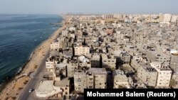 نمایی از شهر جنگ زده غزه که طیاره های بدون سرنشین امریکایی حرکات افراد وابست به گروه حماس را نظارت می کنند 