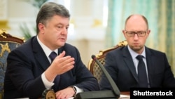 Президент України Петро Порошенко та прем’єр Арсеній Яценюк, архівне фото (©Shutterstock)
