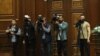 Armenia - Cameramen and a photojournalist follow a session of the Armenian parliament, Yerevan, April 18, 2023.