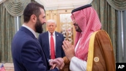 In this photo released by the Saudi Royal Palace, President Donald Trump (center) watches Saudi's Crown Prince Muhammed bin Salman (right) shake hands with Syria's interim President Ahmad al-Sharaa in Riyadh on May 14.