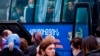 ARMENIA -- Ethnic Armenians look out from a bus window as they return to Stepanakert from Yerevan, Novemebr 16, 2020