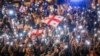 Грузияда нааразылык акцияга чыккандар чагымга кабылганын айтышты 