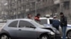 Armenia -- Traffic police investigate a car collision in Yerevan, 11Jan2010.