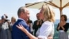 Then-Austrian Foreign Minister Karin Kneissl dances with Russian President Vladimir Putin at her wedding on August 18, 2018.