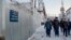 Prison guards walk inside a prison in the town of Kharp, in a photo released by the human rights ombudsman of the Yamalo-Nenets autonomous district on December 15.