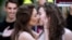 France -- Two women kiss on 23Apr2013 during a pro gay marriage demonstration called by the "oui , oui, oui" (yes, yes, yes) movement outside the French national assembly in Paris.