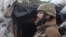Украинский военнослужащий на передовой позиции на линии разграничения сил недалеко от оккупированного Донецка, апрель 2021 года