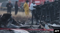 Уламки на місці катастрофи турецького військового вантажного літака C-130 у районі Сігнагі на кордоні Грузії й Азербайджану, 12 листопада 2025 року