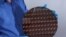 A silicon wafer containing chips made with IBM Corp's 2-nanometer transistor technology, May 6, 2021. 