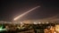 SYRIA – The Damascus sky lights up missile fire as the U.S. launches an attack on Syria targeting different parts of the capital early Saturday, April 14, 2018