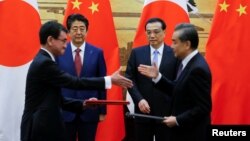 Синдзо Абэнин Бээжиндеги сапарында ири экономикалык келишимдерге кол коюлду.