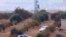 Снимок, сделанный с выложенного в YouTube видео: сирийская армия совершает рейд по фермам севернее Хамы