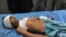 A wounded boy receives treatment at a hospital in Jalalabad after an explosion in the Ghani Khel district of Nangarhar province, which killed at least 14 people. 