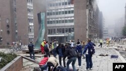 Последствия взрыва у здания правительства Норвегии. Осло, 22 июля 2011 г. AFP PHOTO / SCANPIX / HOLM MORTEN. 